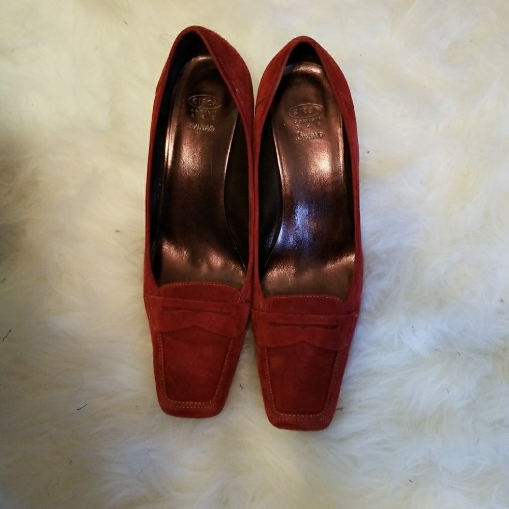 Red suede pumps